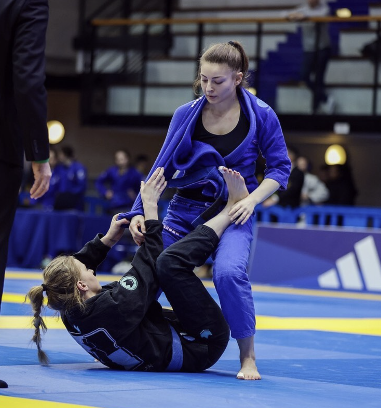 1:1 client competing in BJJ match
