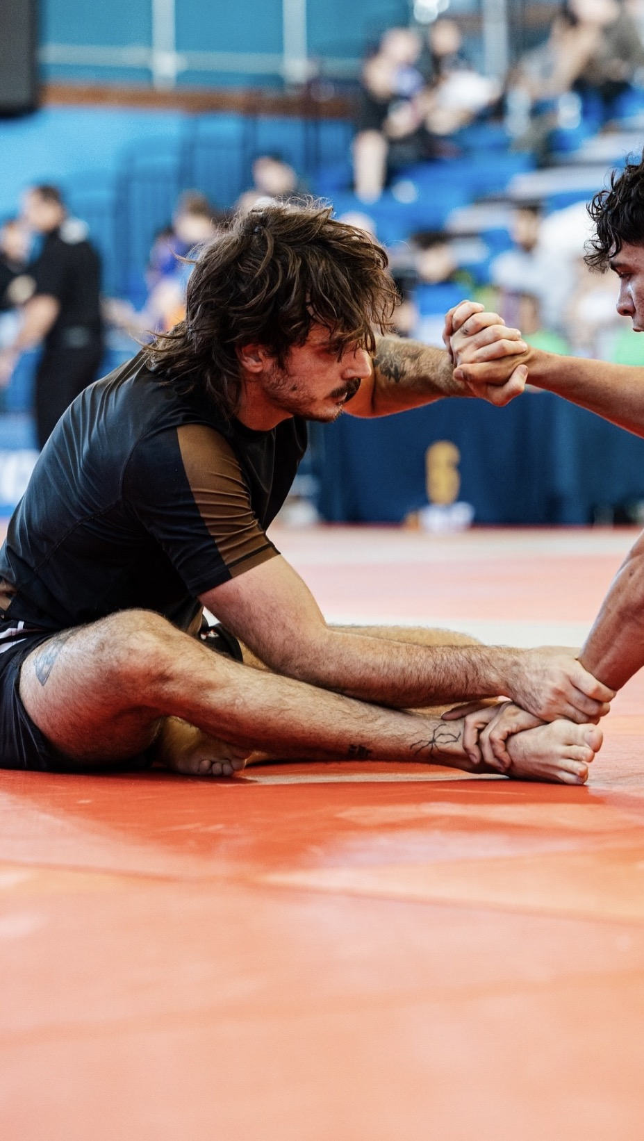 1:1 client competing in a BJJ match